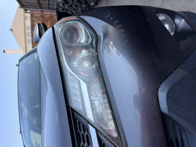 Cloudy Toyota RAV4 driver headlight before restoration